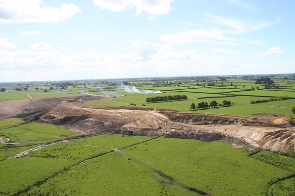 Illegal earthworks undertaken to re-contour a slope near the Waihou River